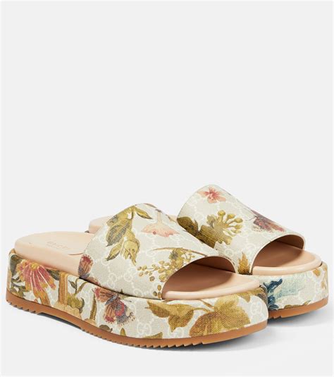 gucci floral platform slides.